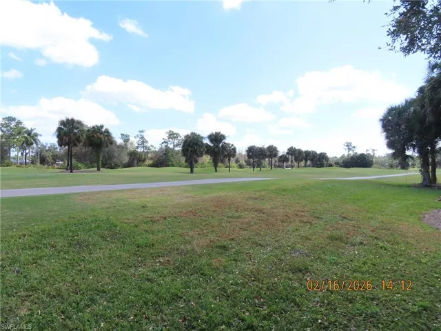 Surrounding community featuring view of golf course