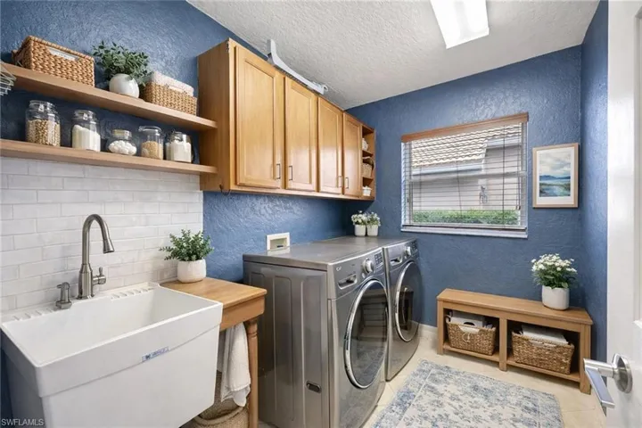 Digitally staged laundry room