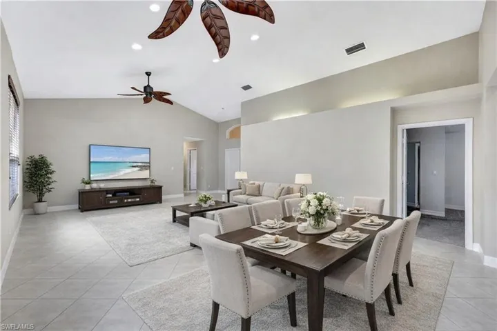 Digitally staged living room and dining room set up