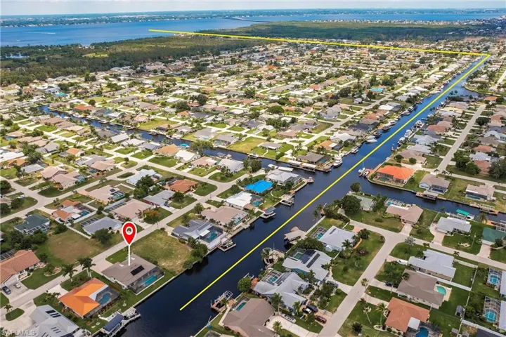 Drone / aerial view with a water view out to the Gulf