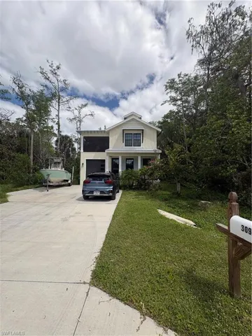 3123  Pine Tree  DR, Naples, FL 34112