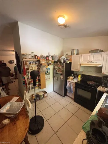 3123  Pine Tree  DR, Naples, FL 34112