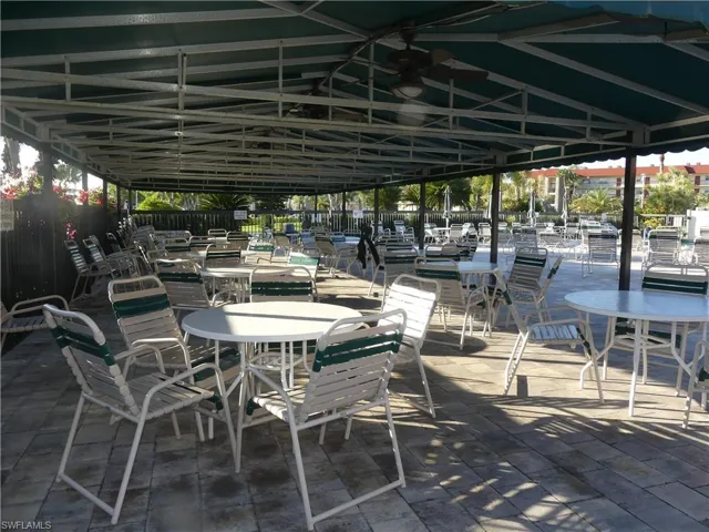 VERY LARGE DECK AREA WITH SHADED TABLES