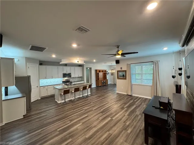 Great Room, kitchen, and dining area.