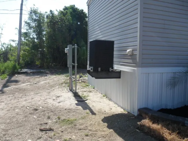 View of property exterior with central air condition unit
