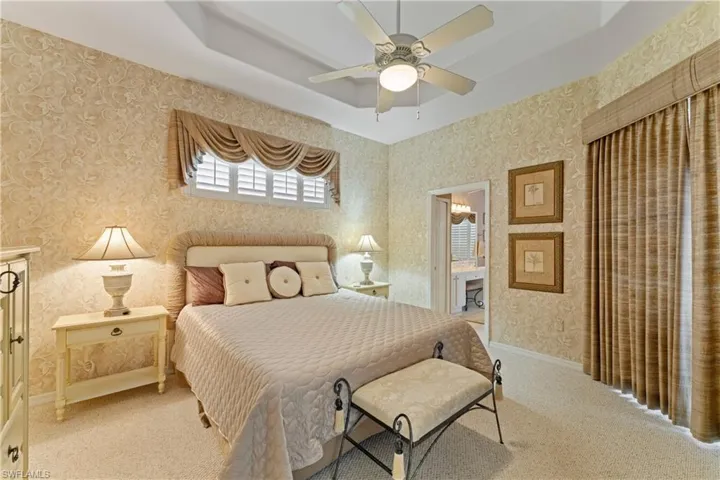 Spacious master suite featuring two generous walk-in closets for ample storage and comfort.