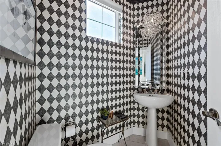 Half bathroom featuring toilet and elevator