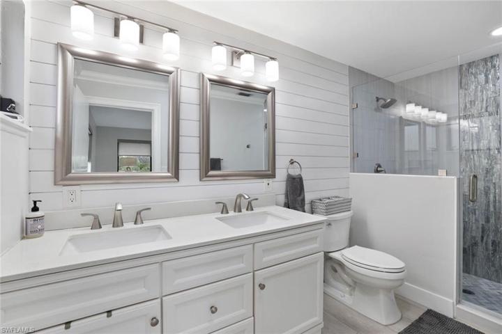 Renovated primary bath:  expanded the shower, new cabinet, counters, lighting, etc