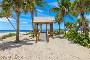 View of play area with view of water and beach access.