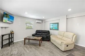 Living area/ extra bedroom next to the pool area.