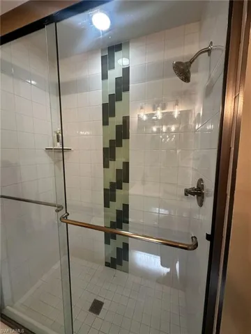 Bathroom featuring a shower stall