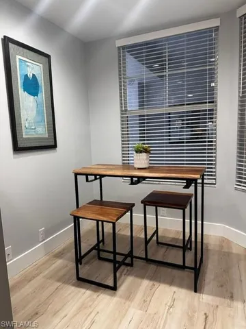 Dining area with wood finished floors