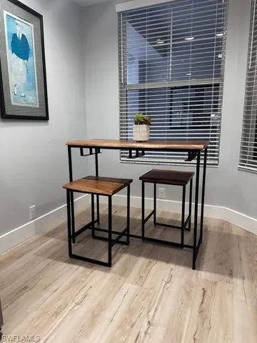 Dining space featuring wood finished floors