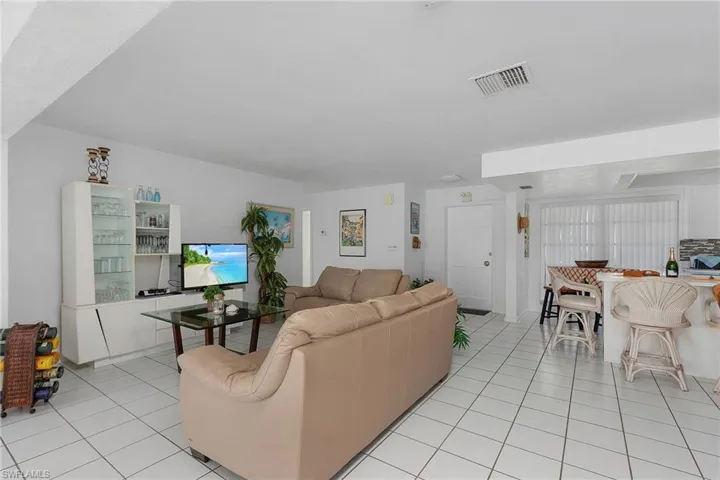 Living room with light tile floors