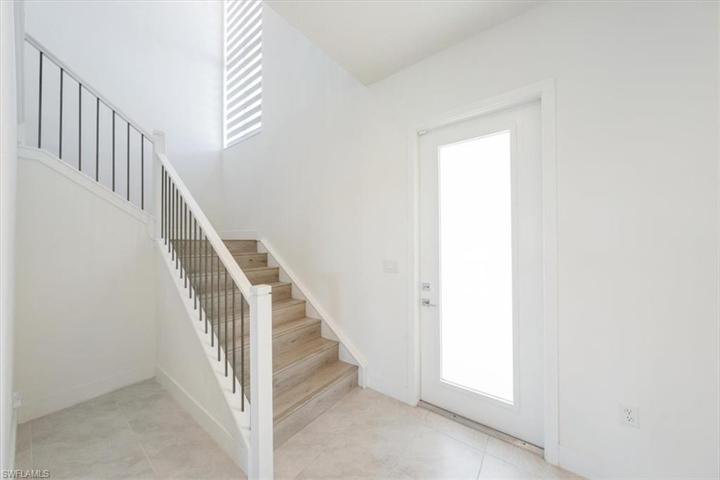 Entry Foyer w/wooden staircase