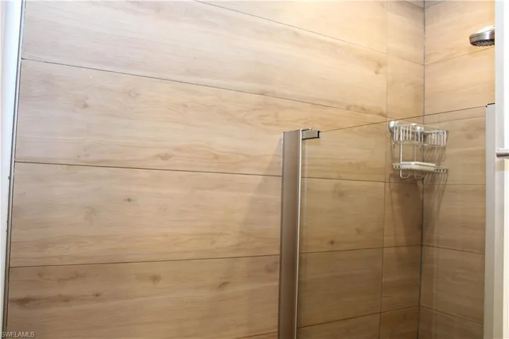 Interior details with a tile shower