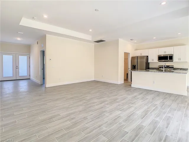 and light hardwood / wood-style flooring
