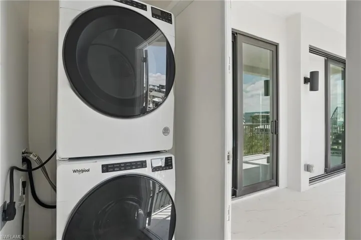 Dtacked washer / dryer and marble look tile flooring - VIRTUALLY EDITED