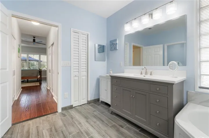 Linen Closet and two walk in closets in the hallway to Master Bedroom