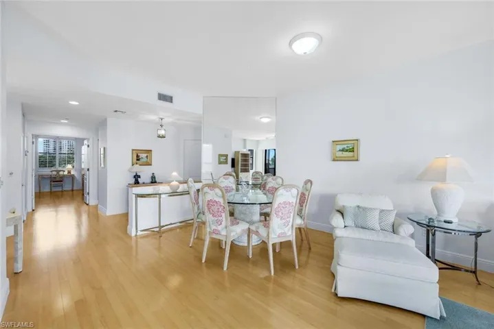Dining space with light wood finished floors and baseboards