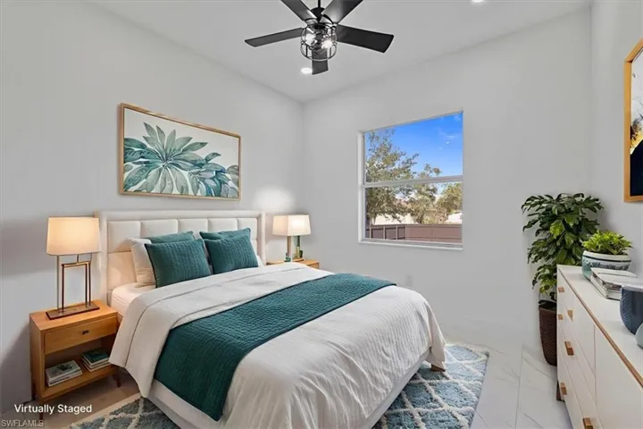 Bedroom featuring recessed lighting and a ceiling fan