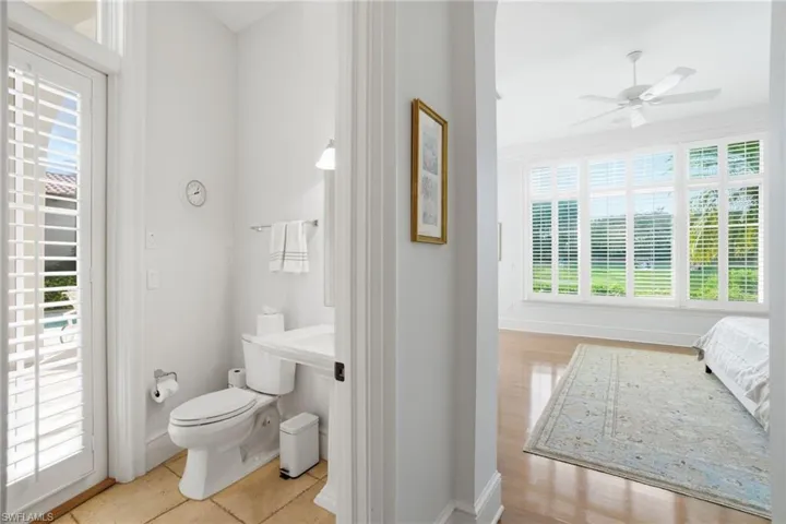 Second Water Closet in Primary Bathroom with pool access