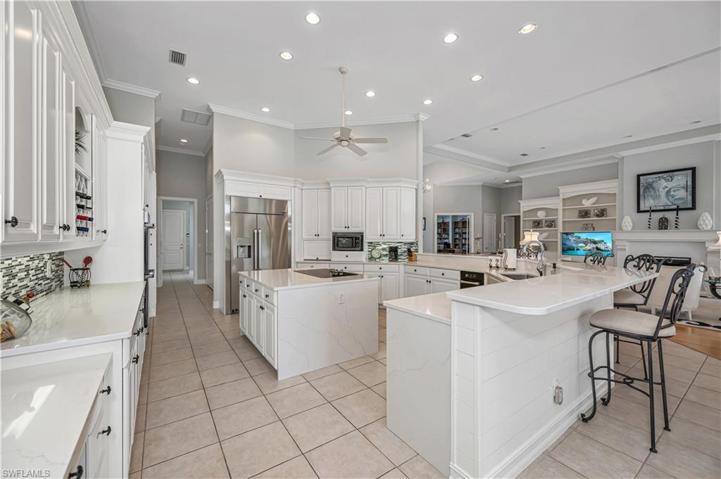 Dacor Refrigerator and ovens, induction cooking, desk area and extra long breakfast bar