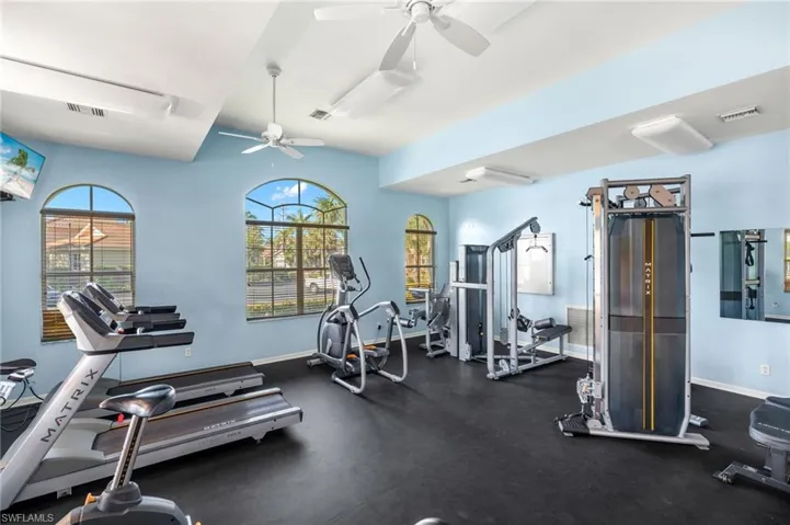 Workout area featuring a ceiling fan