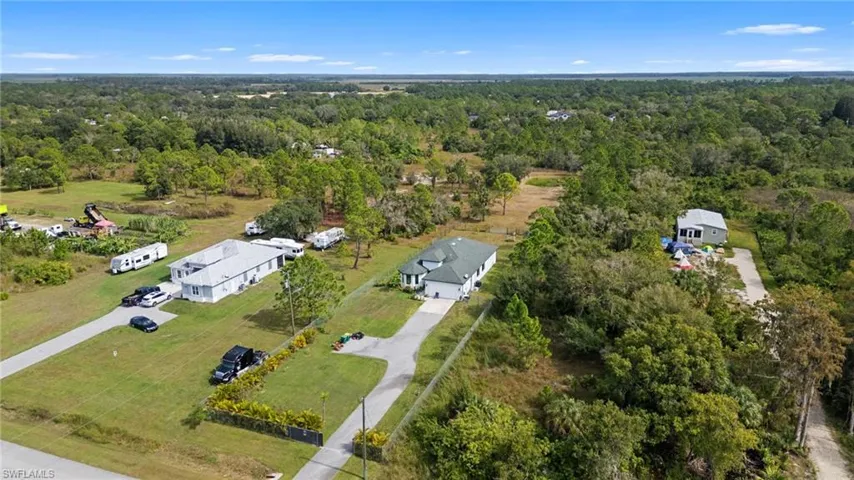 View of property location featuring a heavily wooded area
