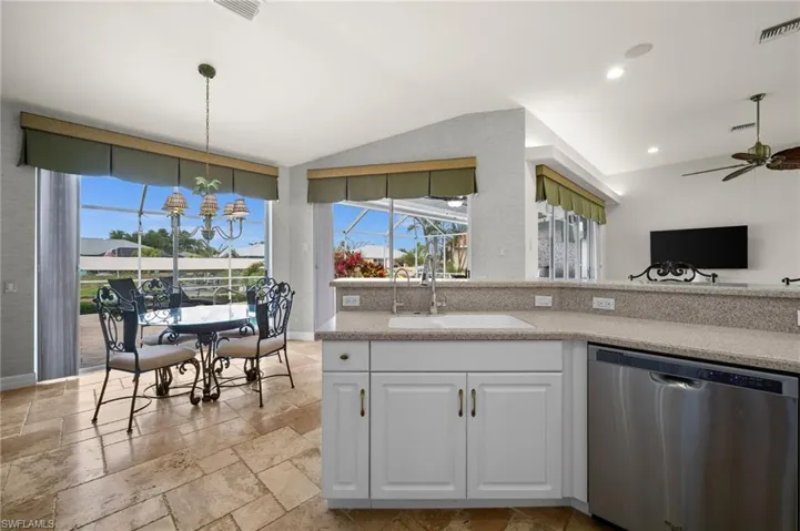 The kitchen with a view of the pool