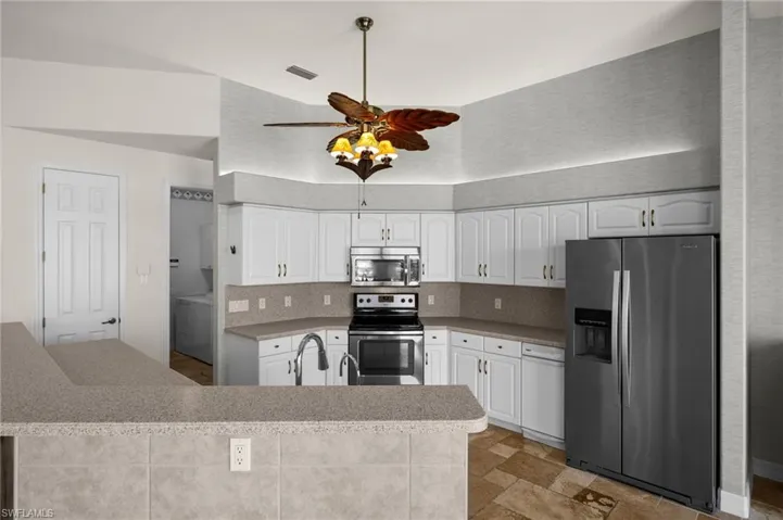 Open Kitchen with all stainless appliances
