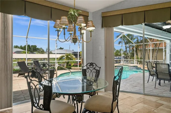 The dining room is just steps from the lanai
