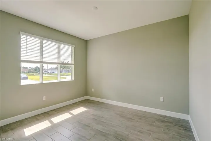 Spare room featuring light hardwood / wood-style floors