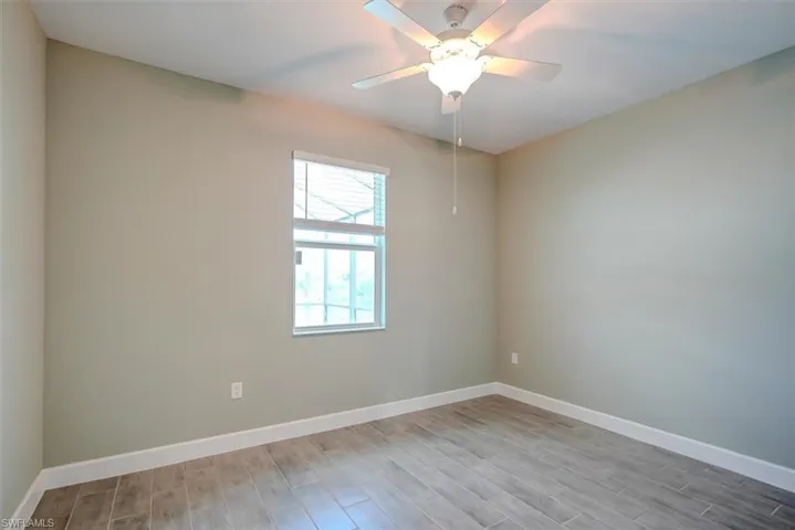 2nd Spare room featuring light hardwood / wood-style flooring and ceiling fan