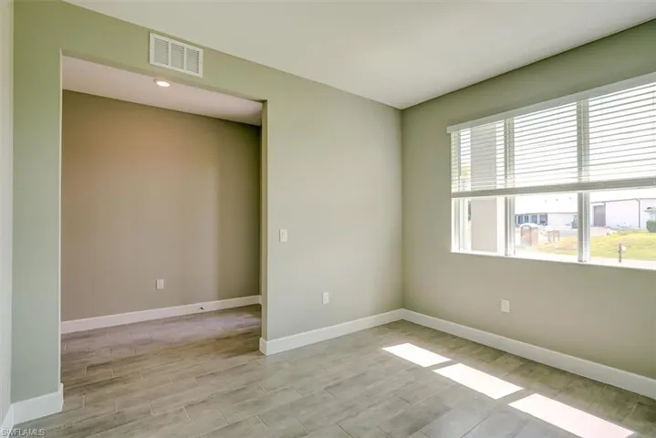 Spare room with light hardwood / wood-style floors