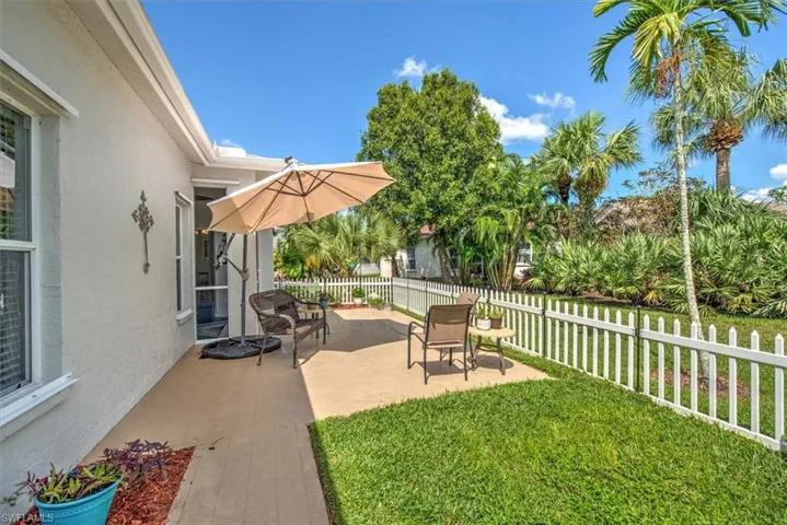 View of yard featuring fenced patio area