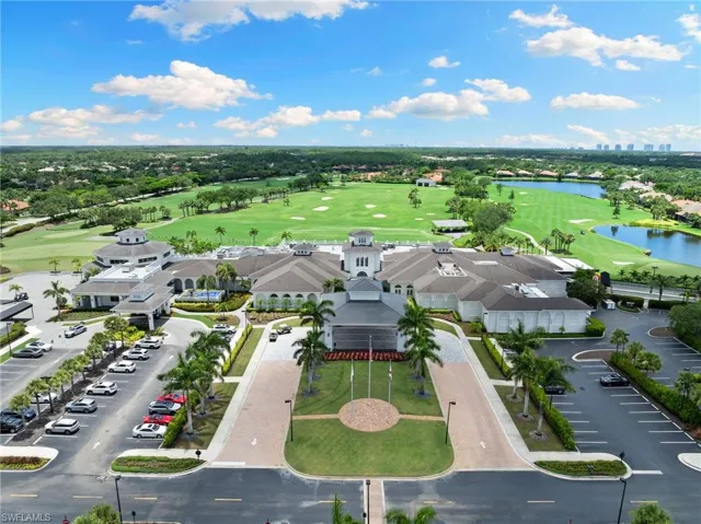 Aerial view of a nearby body of water and a golf course