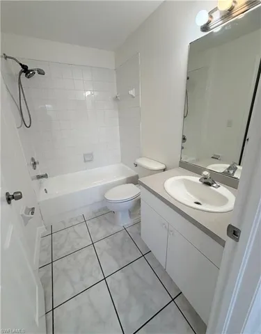 Master bathroom with large walk in closet