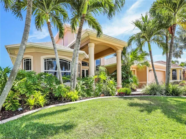 View of front of house with a front lawn