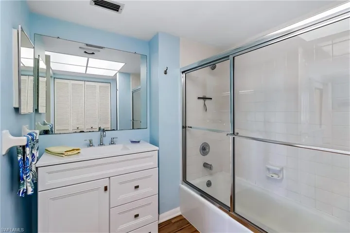 Enclosed shower/tub combo.
