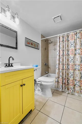Guest bath with new vanity, plumbing fixtures, rain shower and bidet