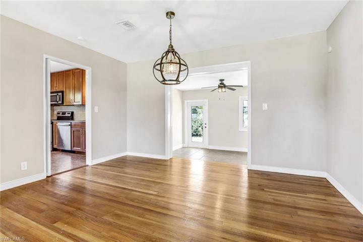Formal Dining Room with Lovely Light Fixture