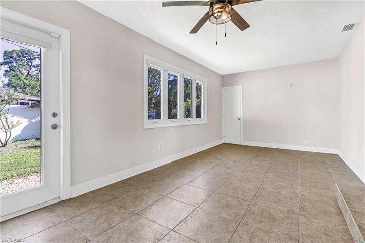 Large Sunroom with Plenty of Windows.  This room can be used in many different ways.