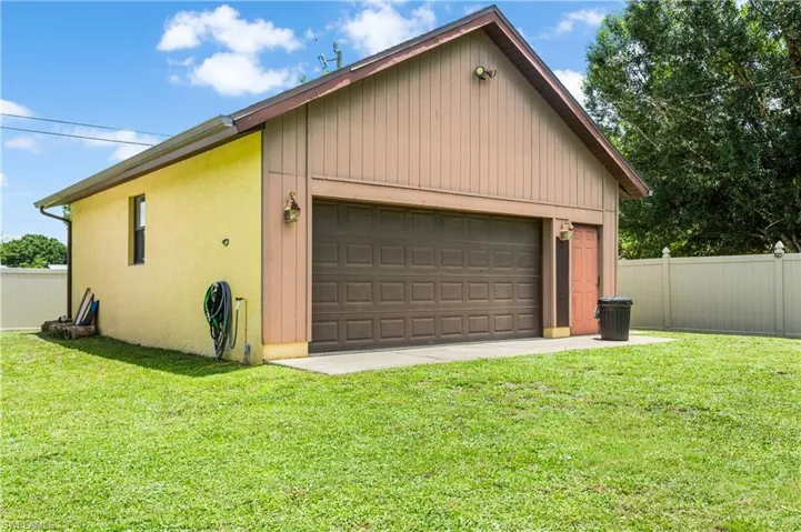 Garage with a lawn