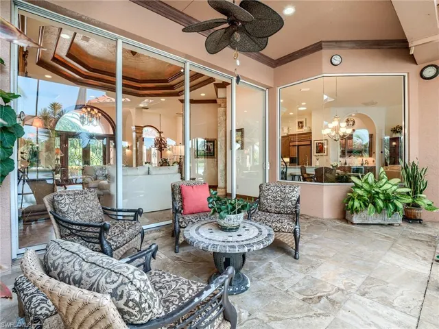View of patio featuring ceiling fan