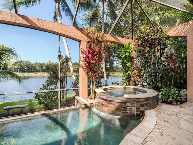 View of pool featuring an in ground hot tub