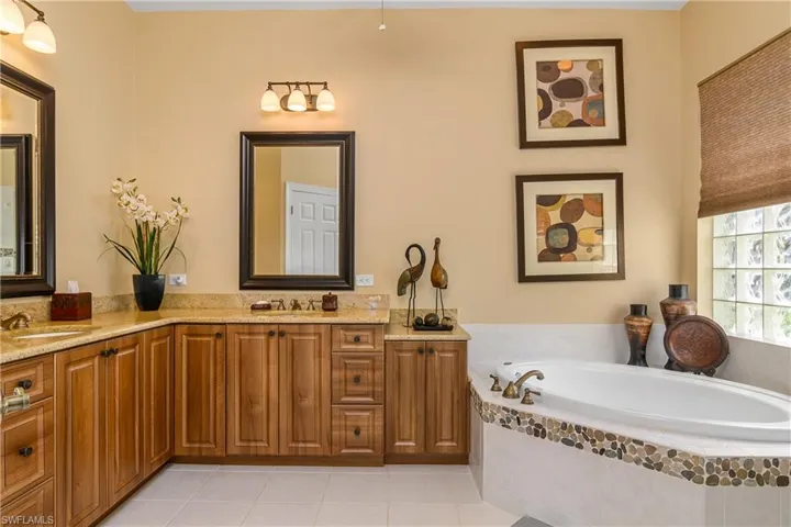 Master bath, granite counters, new cabinetry, custom mirrors, soaking tub and walk-in shower