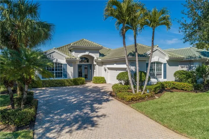 Located in desirable community of Hawthorne, 4 bedrooms, 3 full baths, enlarged 2 car garage and huge lanai with paver stone deck and natural gas heated pool and spa. Spectacular water view!