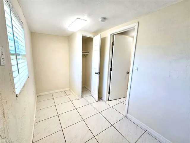 Bonus room with closet and window, ideal for office, guest, or flex use.