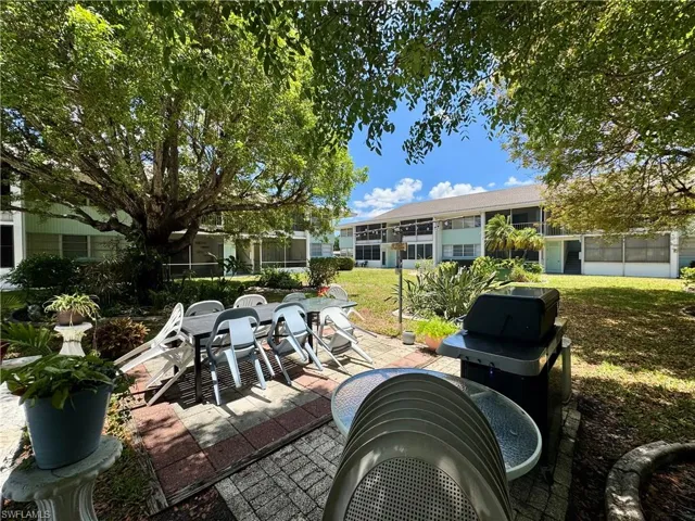 View of patio featuring area for grilling